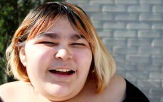 A Young Woman with a Big Smile