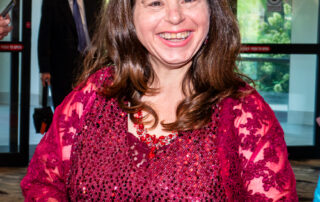 Emily Dias walking down the red carpet