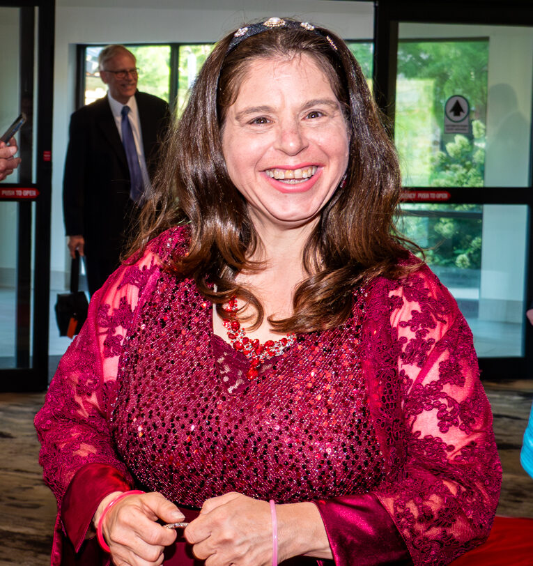 Emily Dias walking down the red carpet