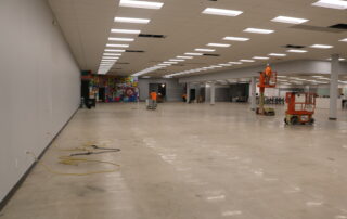 A photo of a wide open, empty room.